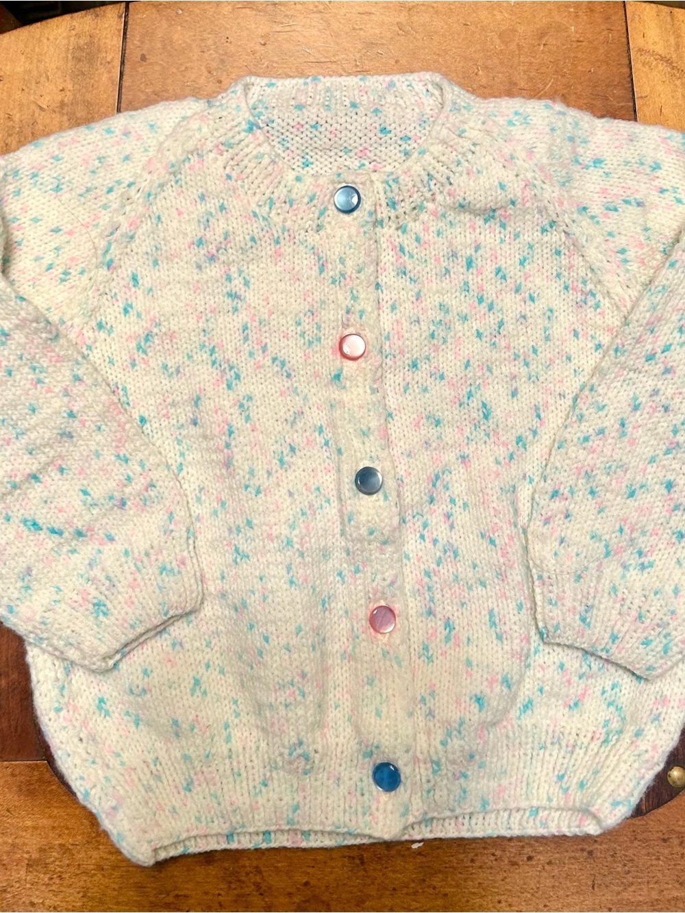 New, hand knit toddler cardigan made by grandma